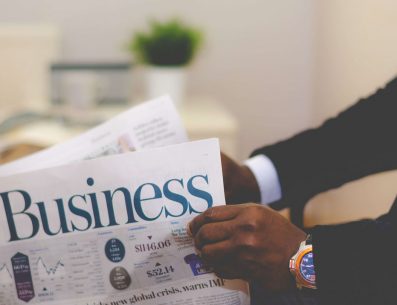 man-reading-business-newspaper